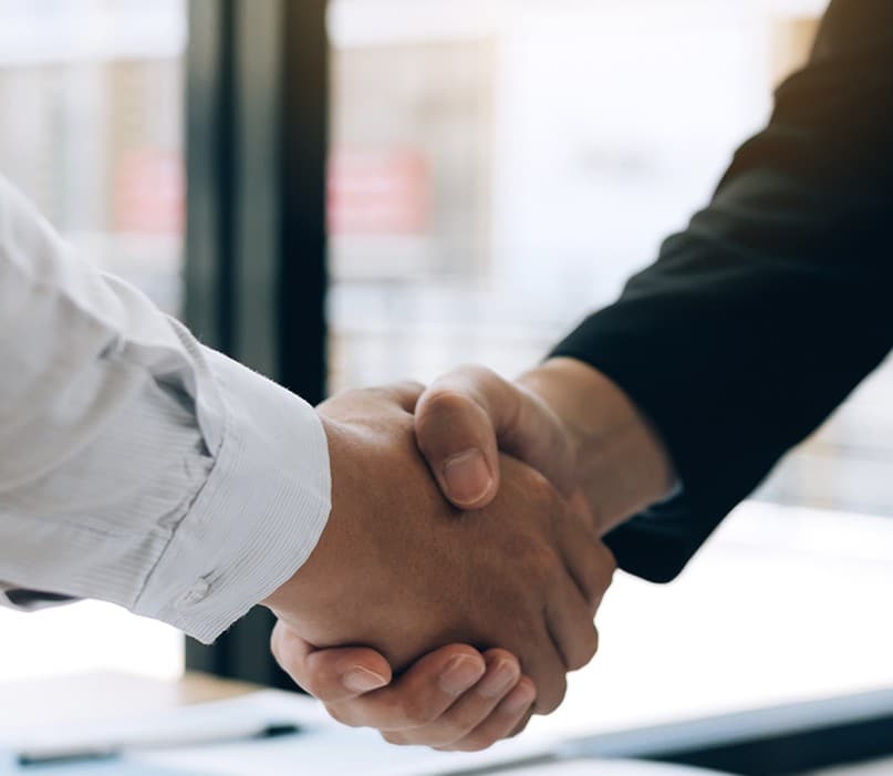 Two people shaking hands